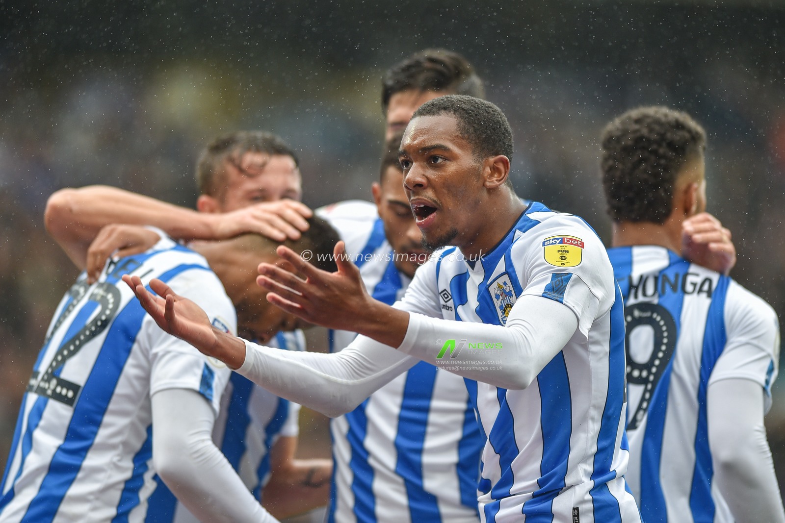 28th September 2019, John Smith's Stadium, Huddersfield, England; Sky Bet Championship, Huddersfield Town v Millwall , Jaden Brown (28) of Huddersfield Town encourages the Cowshed end to celebrate Fraizer Cambell opening goal.
Credit: Dean Williams/News Images