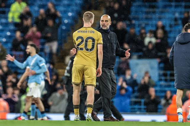 Josep Guardiola manager of Manchester City embraces Adam Wharton of Crystal Palace after the game during the Premier League match Manchester City vs Crystal Palace at Etihad Stadium, Manchester, United Kingdom on 13 May 2026

(Photo by Mark Cosgrove/News Images)