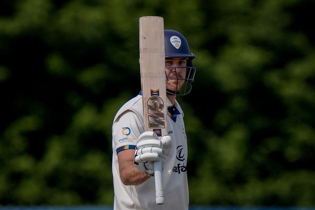 Matthew Montgomery raises his bat to the pavilion to celebrate scoring a fifty during the county Championship Division Two day 4 Derbyshire vs Gloucestershire at The Central Co-Op County Ground, Derby, United Kingdom on 27 April 2026

(Photo by Maynard Manyowa/News Images)