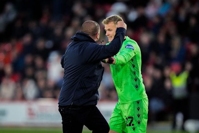 Blackburn Rovers goalkeeper Balazs Toth reacts after a fan invades the pitch to celebrate Yuki Ohashi of Blackburn Rovers scoring a goal to make it 0-2  during the Sky Bet Championship match Sheffield United vs Blackburn Rovers at Bramall Lane, Sheffield, United Kingdom on 22 April 2026

(Photo by Maynard Manyowa/News Images)