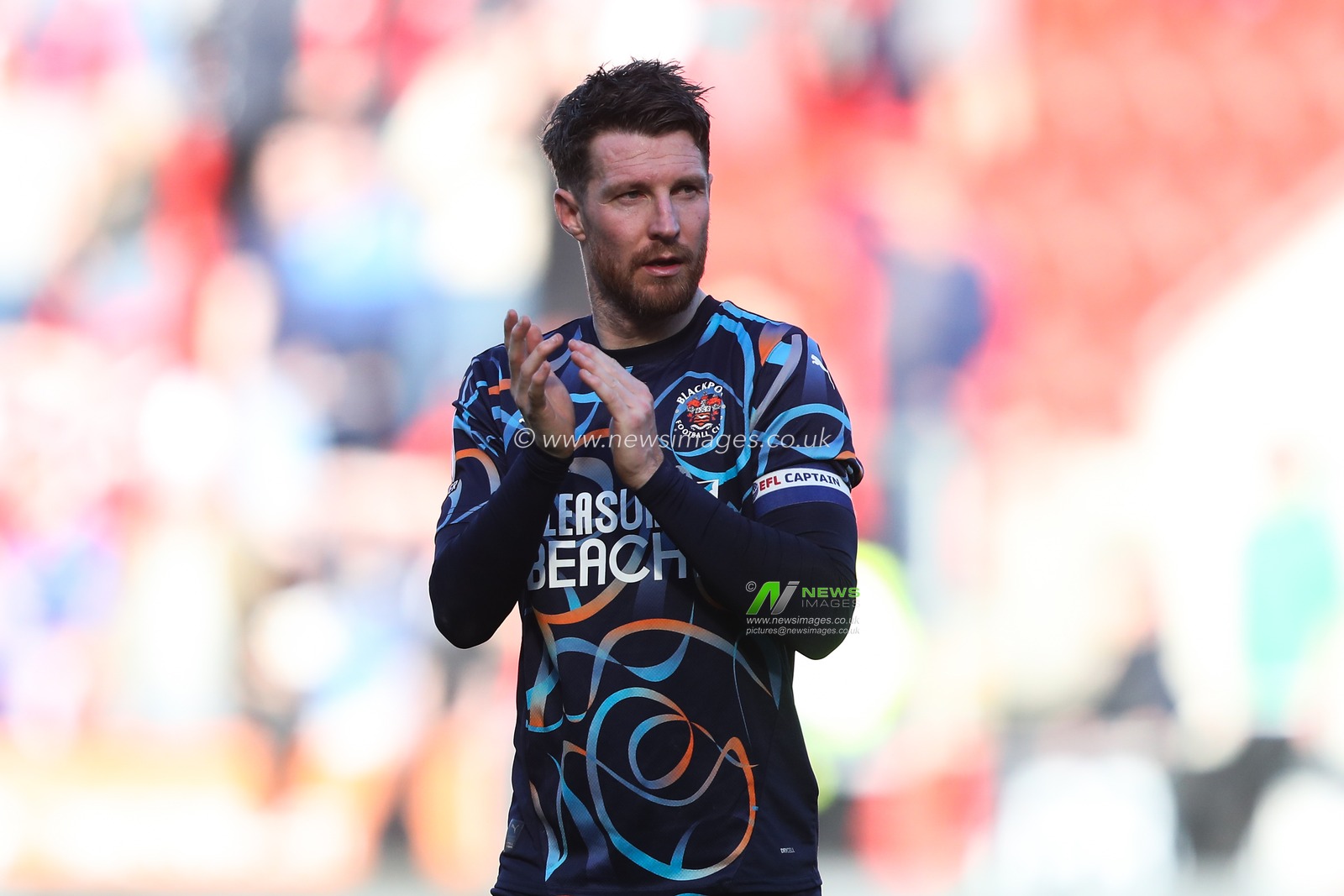 James Husband of Blackpool applauds the travelling fans after  the Sky Bet League 1 match Rotherham United vs Blackpool at New York Stadium, Rotherham, United Kingdom, 5th April 2025

(Photo by Gareth Evans/News Images)