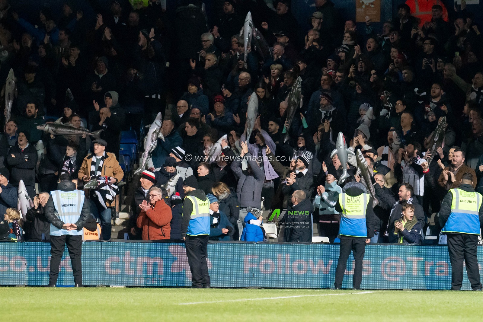 Grimsby fans with their blow up fish during the Emirates FA Cup Fourth Round match Luton Town vs Grimsby Town at Kenilworth Road, Luton, United Kingdom, 28th January 2023

(Photo by Richard Washbrooke/News Images)
