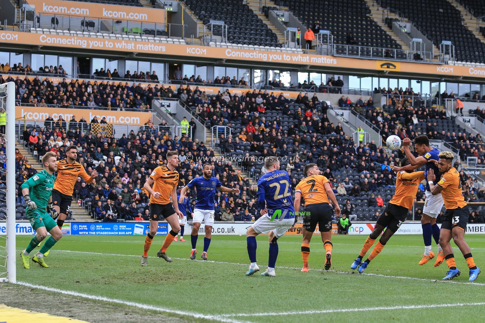 1st February 2020, KC Stadium, Kingston upon Hull, England; Sky Bet Championship, Hull City v Brentford : Ollie Watkins (11) of Brentford heads the ball towards goal which is then headed in to his own goal by Reece Burke (5) of Hull City