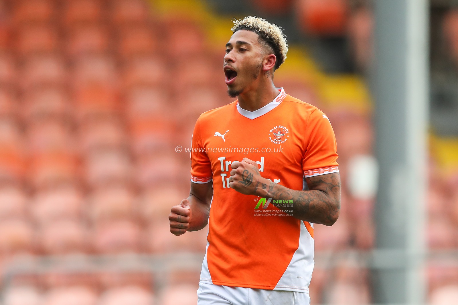 Jordan Lawrence-Gabriel of Blackpool celebrates his teams win after the Sky Bet League 1 match Blackpool vs Exeter City at Bloomfield Road, Blackpool, United Kingdom, 14th September 2024

(Photo by Gareth Evans/News Images)