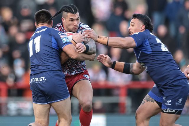 Aaron Pene of Leigh Leopards is tackled by Maxime Stefani of Toulouse Olympique during the Betfred Super League round 6 match Leigh Leopards vs Toulouse at Leigh Sports Village, Leigh, United Kingdom on 28 March 2026

(Photo by Mark Cosgrove/News Images)