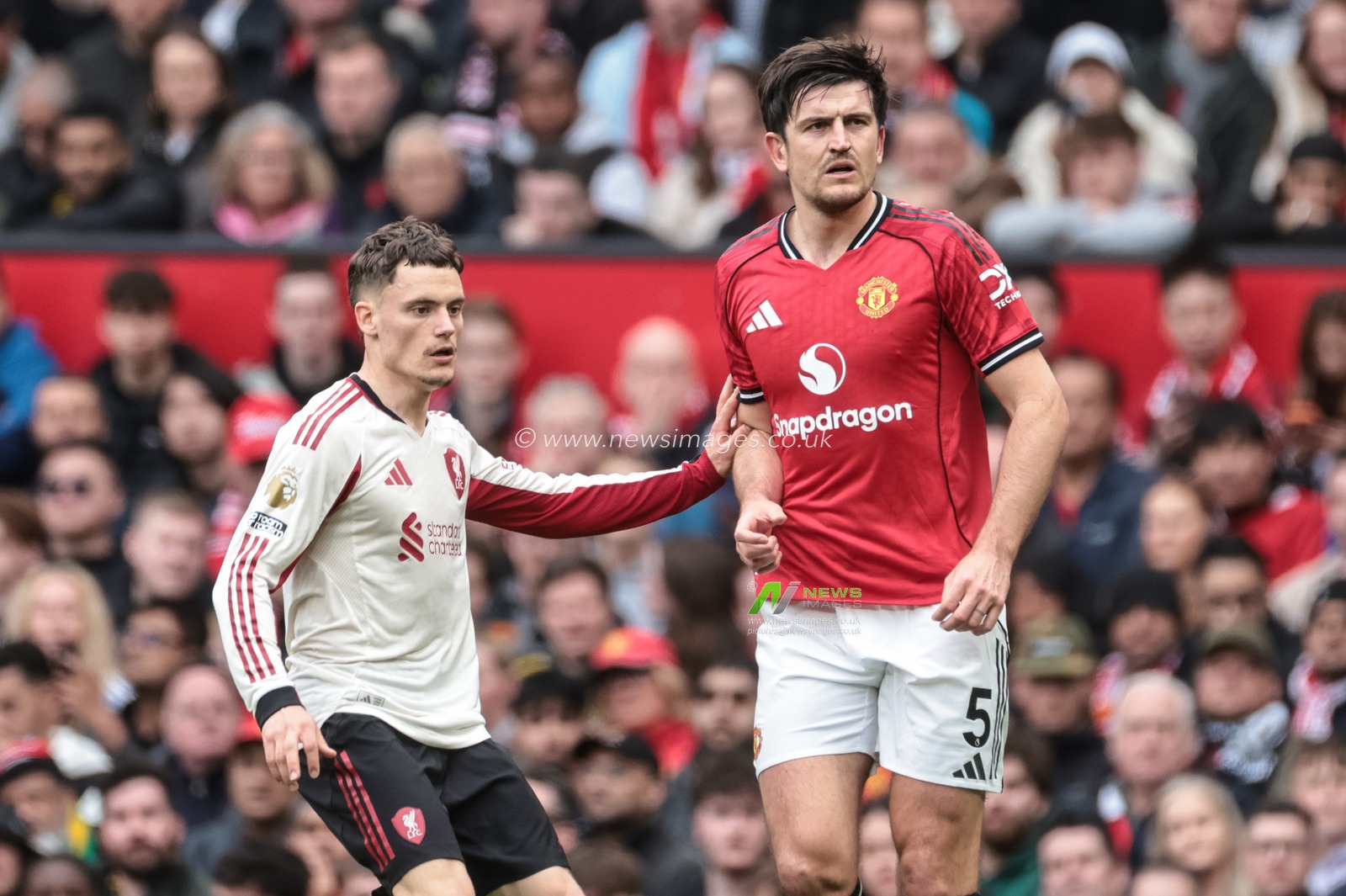 Florian Wirtz of Liverpool holds off Harry Maguire of Manchester United during the Premier League match Manchester United vs Liverpool at Old Trafford, Manchester, United Kingdom on 03 May 2026

(Photo by Mark Cosgrove/News Images)