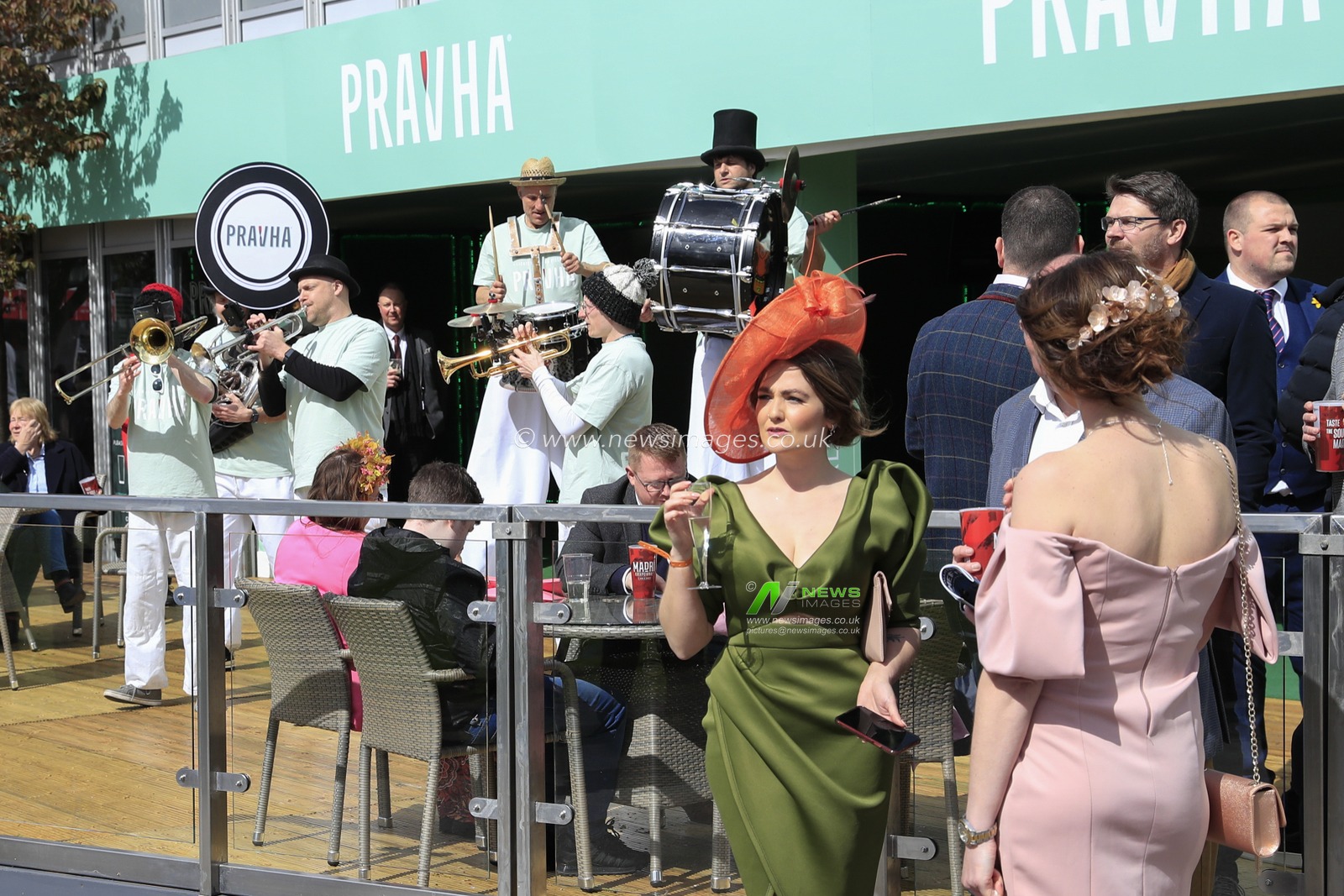 Racegoers enjoying the pre-race entertainment ahead of the Randox Grand National festival 2023 Opening Day at Aintree Racecourse, Liverpool, United Kingdom, 13th April 2023

(Photo by Conor Molloy/News Images)
