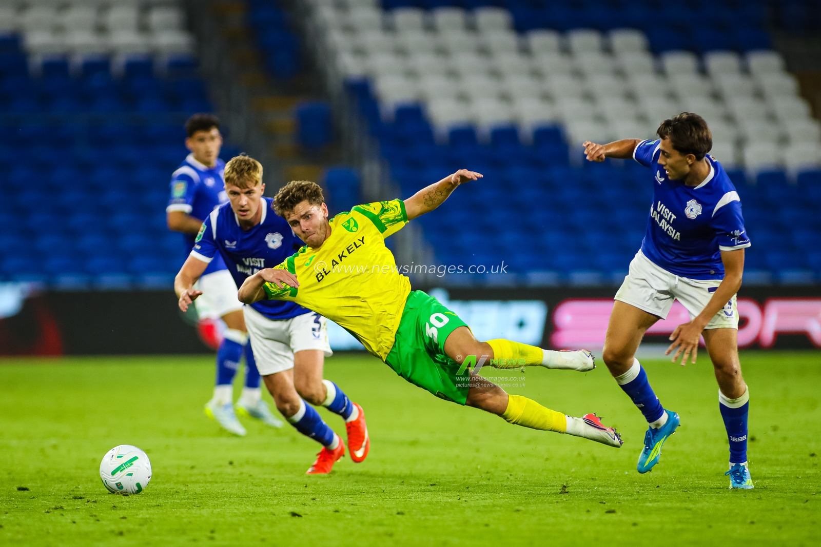 Mathias Kvistgaarden of Norwich City goes to ground during the Carabao Cup round 2 match Cardiff City vs Norwich City at Cardiff City Stadium, Cardiff, United Kingdom on 25 August 2026

(Photo by Andrew Lewis/News Images)