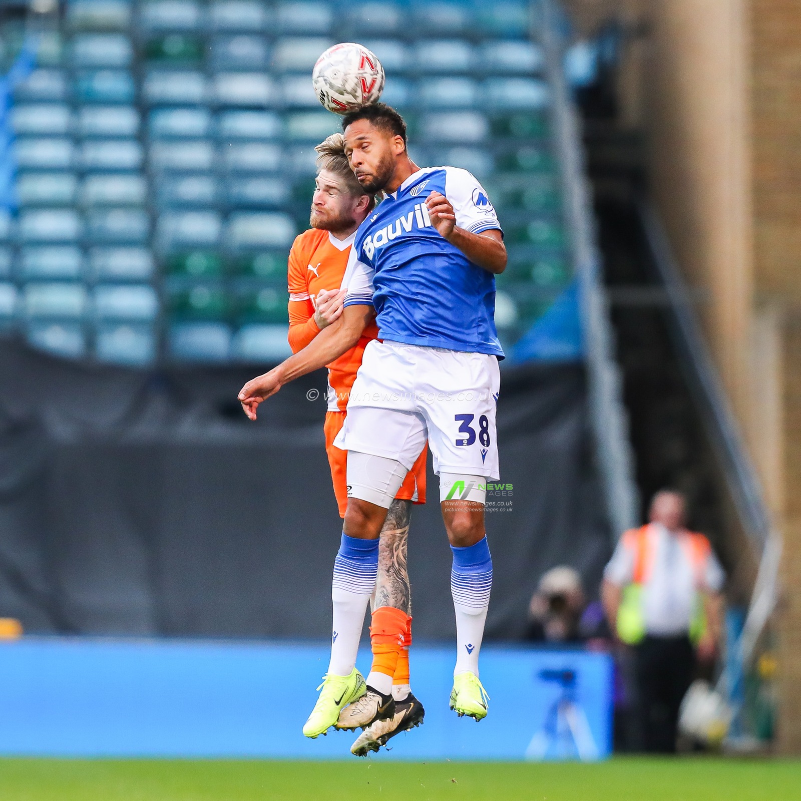 Hayden Coulson of Blackpool jumps for the ball with TimothÃ©e Dieng of Gillingham during the Emirates FA Cup First Round match Gillingham vs Blackpool at MEMS Priestfield Stadium, Gillingham, United Kingdom, 2nd November 2024

(Photo by Izzy Poles/News Images)