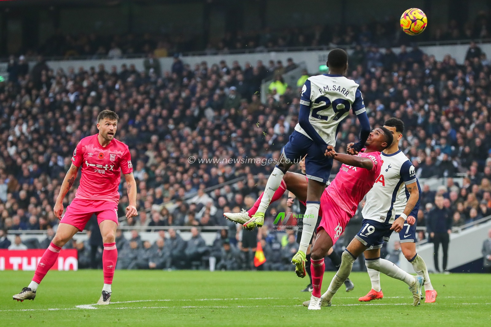 Pape Matar Sarr of Tottenham Hotspur heads the ball during the Premier League match Tottenham Hotspur vs Ipswich Town at Tottenham Hotspur Stadium, London, United Kingdom, 10th November 2024

(Photo by Izzy Poles/News Images)