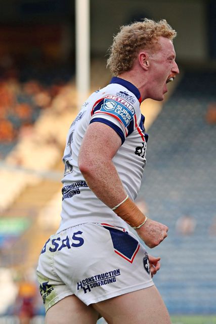 Lachlan Walmsley of Wakefield Trinity celebrates his try during the Betfred Super League round 19 match Huddersfield Giants vs Wakefield Trinity at the Accu Stadium, Huddersfield, United Kingdom, 18th July 2025

(Photo by Sam Eaden/News Images)