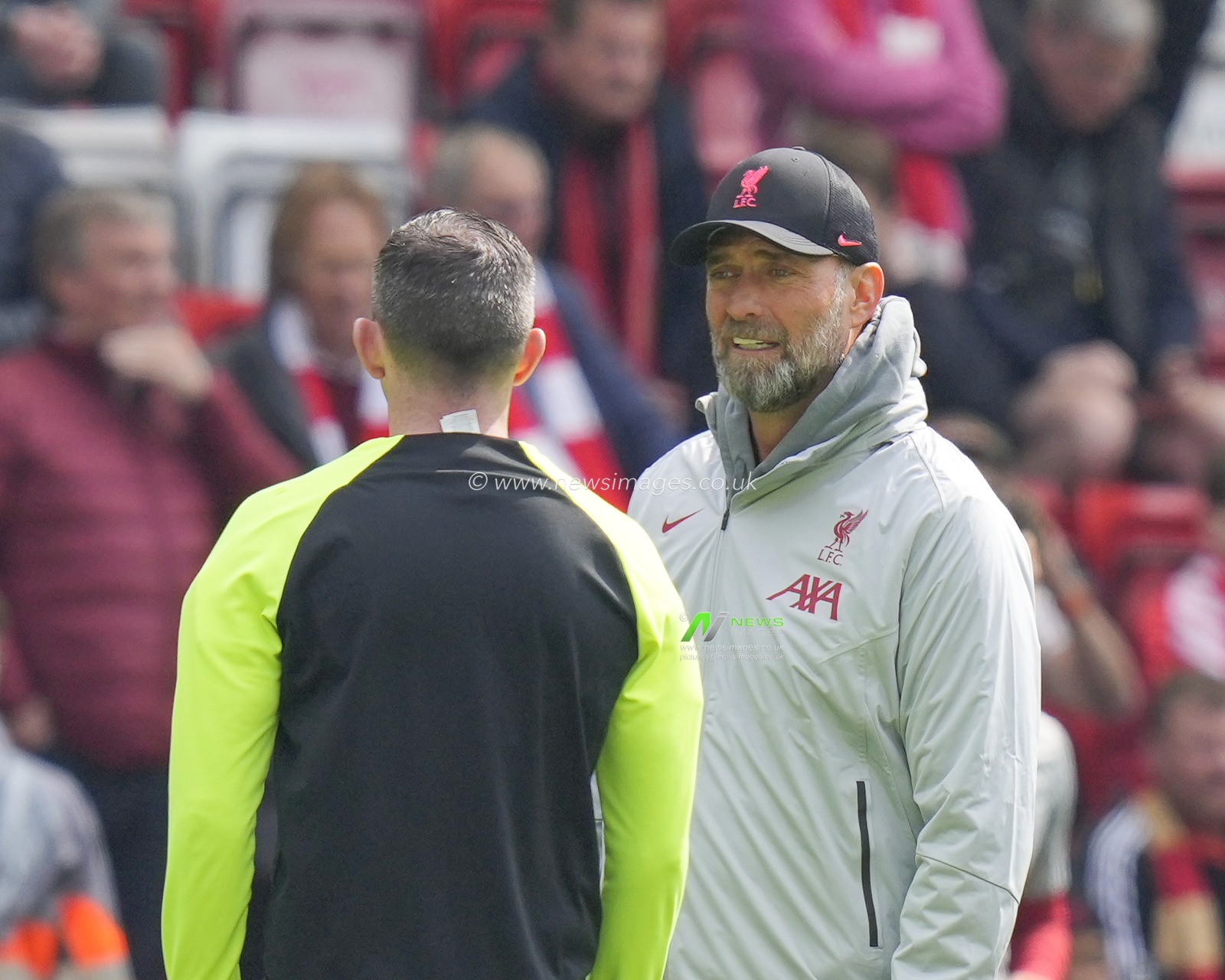 Jurgen Klopp manager of Liverpool speaks with Referee Michael Oliver before the Premier League match Liverpool vs Nottingham Forest at Anfield, Liverpool, United Kingdom, 22nd April 2023

(Photo by Steve Flynn/News Images)
