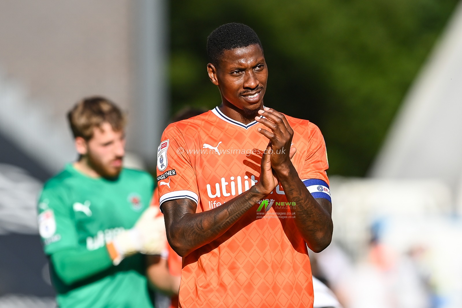 Marvin Ekpiteta #21 of Blackpool applauds the fans at the end of the Sky Bet Championship match Huddersfield Town vs Blackpool at John Smith's Stadium, Huddersfield, United Kingdom, 4th September 2022

(Photo by Craig Thomas/News Images)