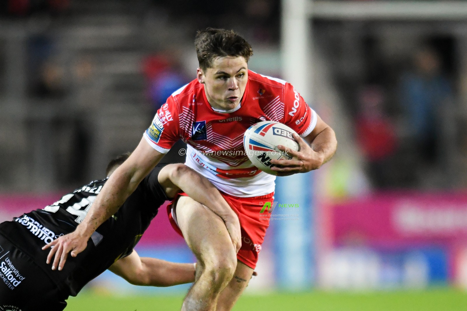 Jack Welsby #1 of St Helens runs forward with the ball