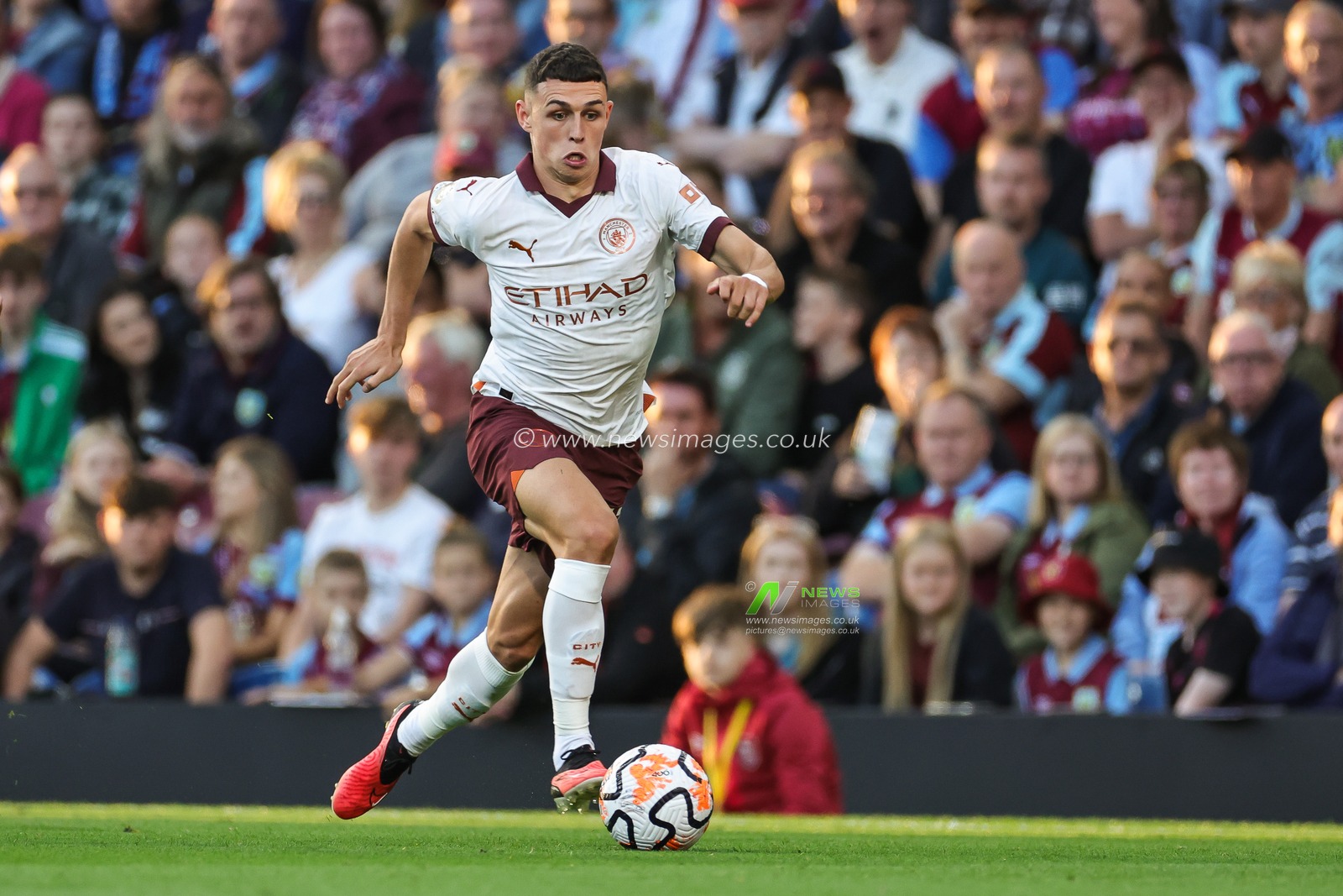 Phil Foden of Manchester City makes a break with the ball  during the Premier League match Burnley vs Manchester City at Turf Moor, Burnley, United Kingdom, 11th August 2023

(Photo by Mark Cosgrove/News Images)