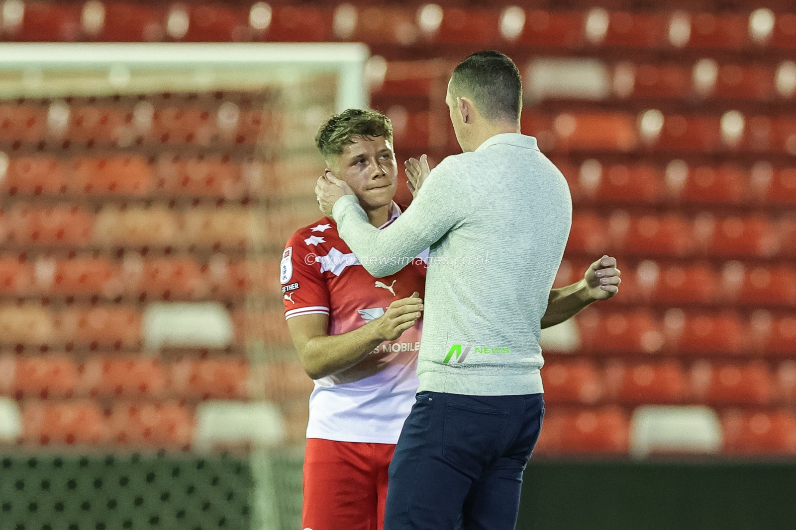Neill Collins Head coach of Barnsley congratulates Aiden Marsh #19 of Barnsley on his goal during the EFL Trophy match Barnsley vs Grimsby Town at Oakwell, Barnsley, United Kingdom, 5th September 2023

(Photo by Mark Cosgrove/News Images)