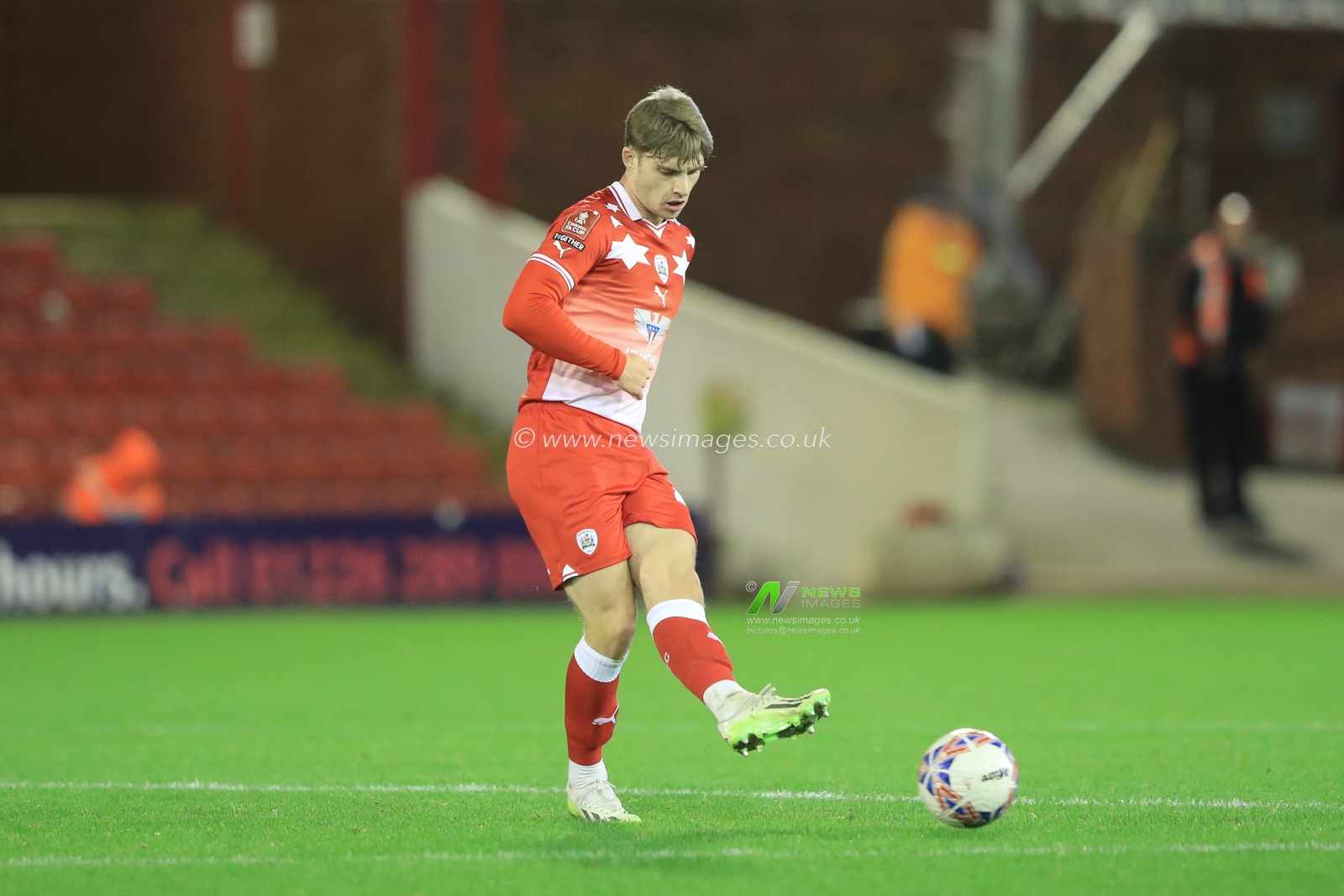 Luca Connell #48 of Barnsley passes the ball during the Emirates FA Cup 1st Round match Barnsley vs Horsham FC at Oakwell, Barnsley, United Kingdom, 3rd November 2023

(Photo by Alfie Cosgrove/News Images)