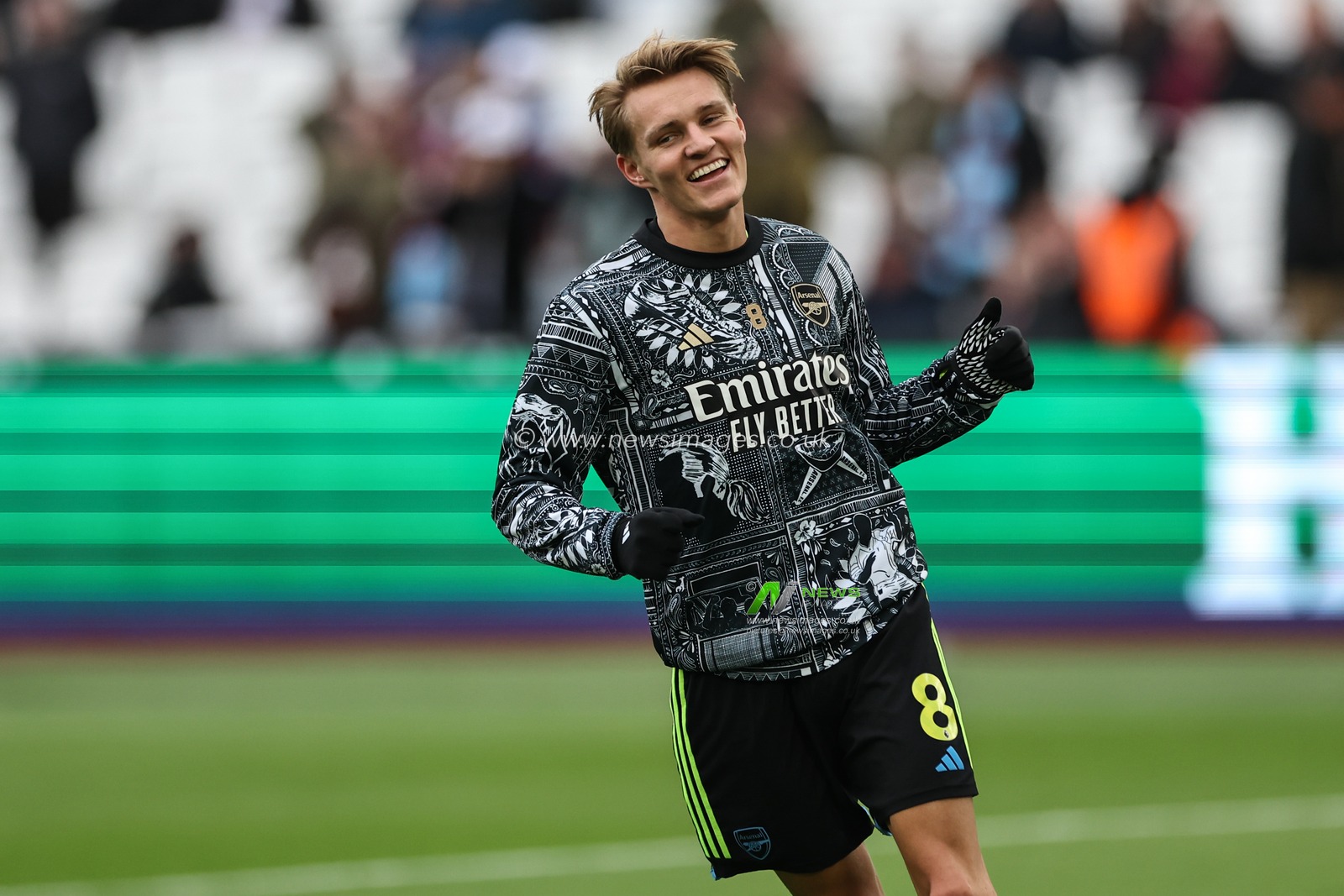 Martin Ã˜degaard of Arsenal in the pregame warmup session during the Premier League match West Ham United vs Arsenal at London Stadium, London, United Kingdom, 11th February 2024

(Photo by Mark Cosgrove/News Images)