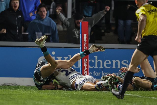 Matty Russell of Wakefield Trinity goes over for a try during the Betfred Challenge Cup Quarter Final match Wakefield Trinity vs Leigh Leopards at DIY Kitchens Stadium, Wakefield, United Kingdom, 4th April 2025

(Photo by Alfie Cosgrove/News Images)
