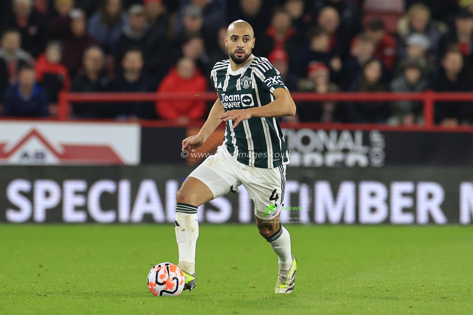 Sofyan Amrabat #4 of Manchester United runs with the ball during the Premier League match Sheffield United vs Manchester United at Bramall Lane, Sheffield, United Kingdom, 21st October 2023

(Photo by Conor Molloy/News Images)