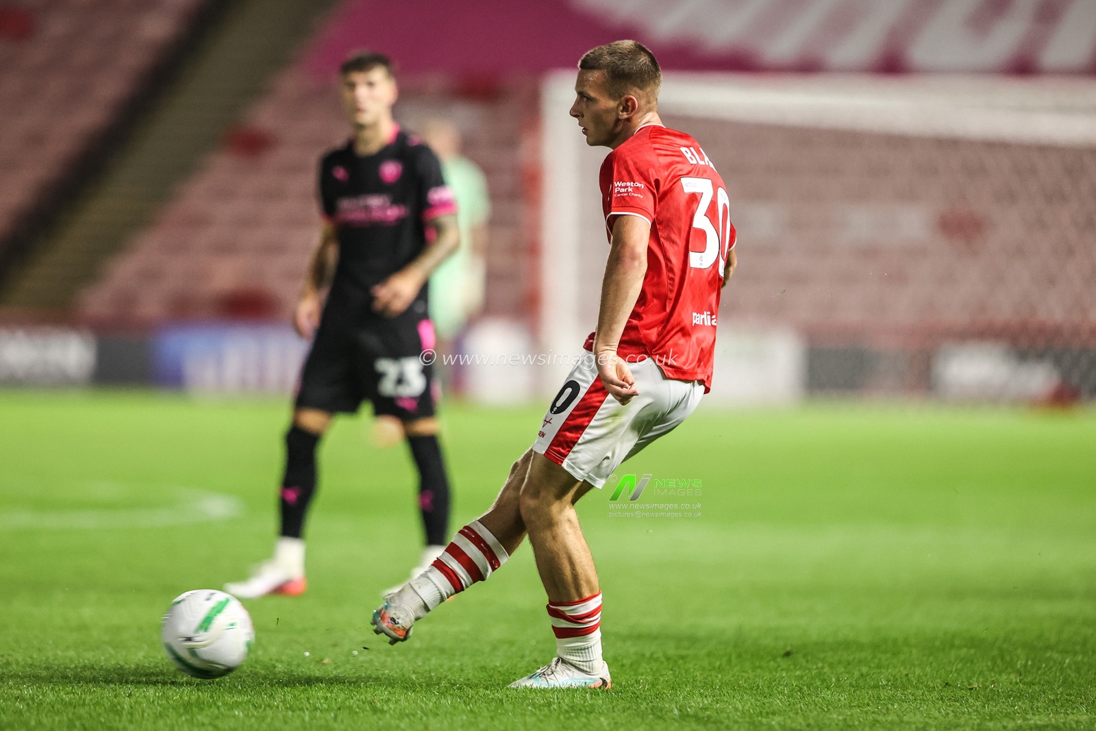 Jonathan Bland of Barnsley passes the ball during the Carabao Cup round 2 match Barnsley vs Crewe Alexandra at Oakwell, Barnsley, United Kingdom on 25 August 2026

(Photo by Alfie Cosgrove/News Images)