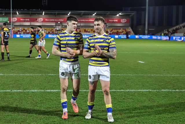 Josh Thewlis of Warrington Wolves and Sam Powell of Warrington Wolves celebrate the win with the fans during the Betfred Super League Round 4 match York Knights vs Warrington Wolves at LNER Community Stadium, York, United Kingdom on 06 March 2026

(Photo by Mark Cosgrove/News Images)