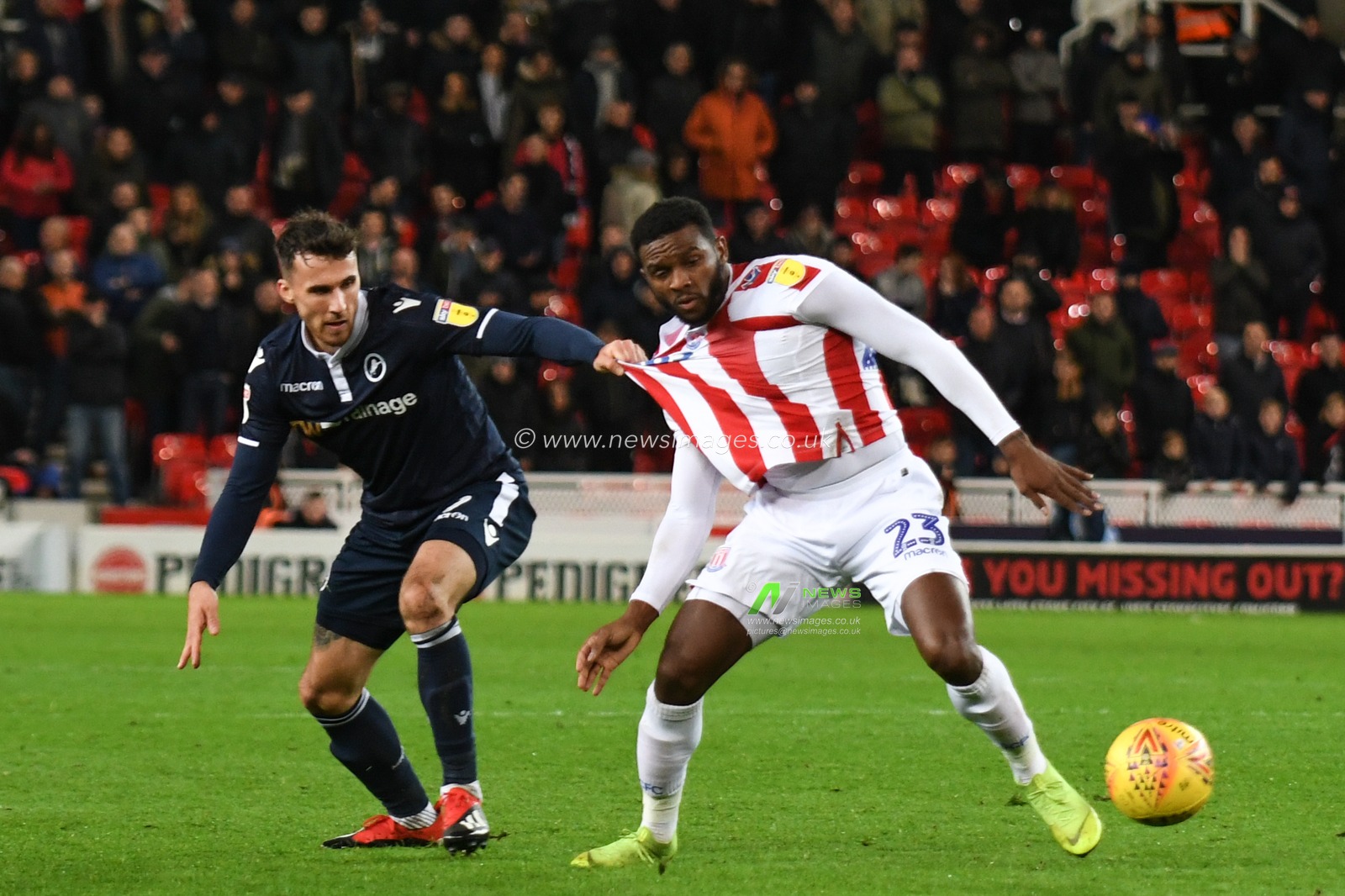 22nd December 2018, Bet 365 Stadium, Stoke-on-Trent, England; Sky Bet Championship, Stoke City vs Millwall ; Cuco Martina of Stoke City is held back by Lee Gregory of Millwall

Credit: Richard Long/News Images

English Football League images are subject to DataCo Licence