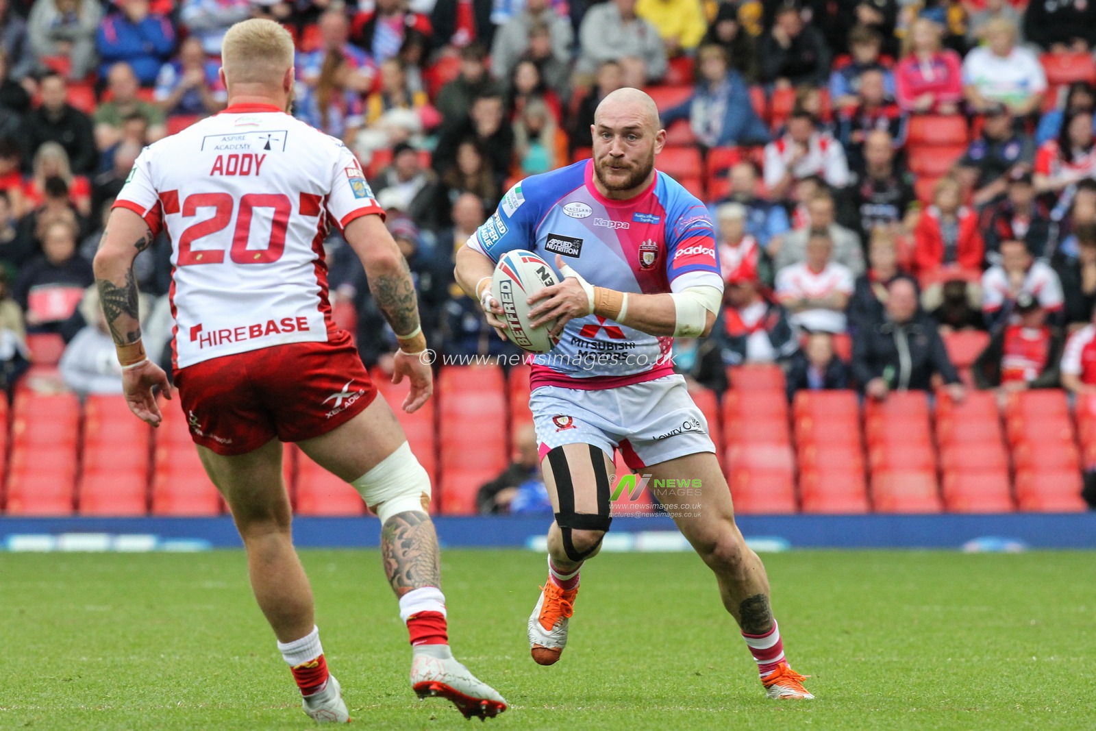26th May 2019 , Anfield Stadium, Liverpool, England; Dacia Magic Weekend, Betfred Super League Round 16, Salford Red Devils vs Hull KR ; Gil Dudson (10) of Salford Red Devils  runs at Danny Addy (20) of Hull KR

Credit: David Greaves/News Images