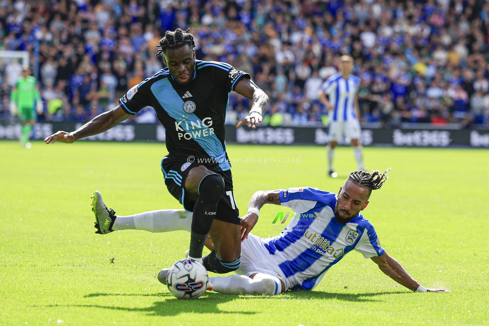 Stephy Mavididi #10 of Leicester City is challenged by Sorba Thomas #14 of Huddersfield Town during the Sky Bet Championship match Huddersfield Town vs Leicester City at John Smith's Stadium, Huddersfield, United Kingdom, 12th August 2023

(Photo by Conor Molloy/News Images)