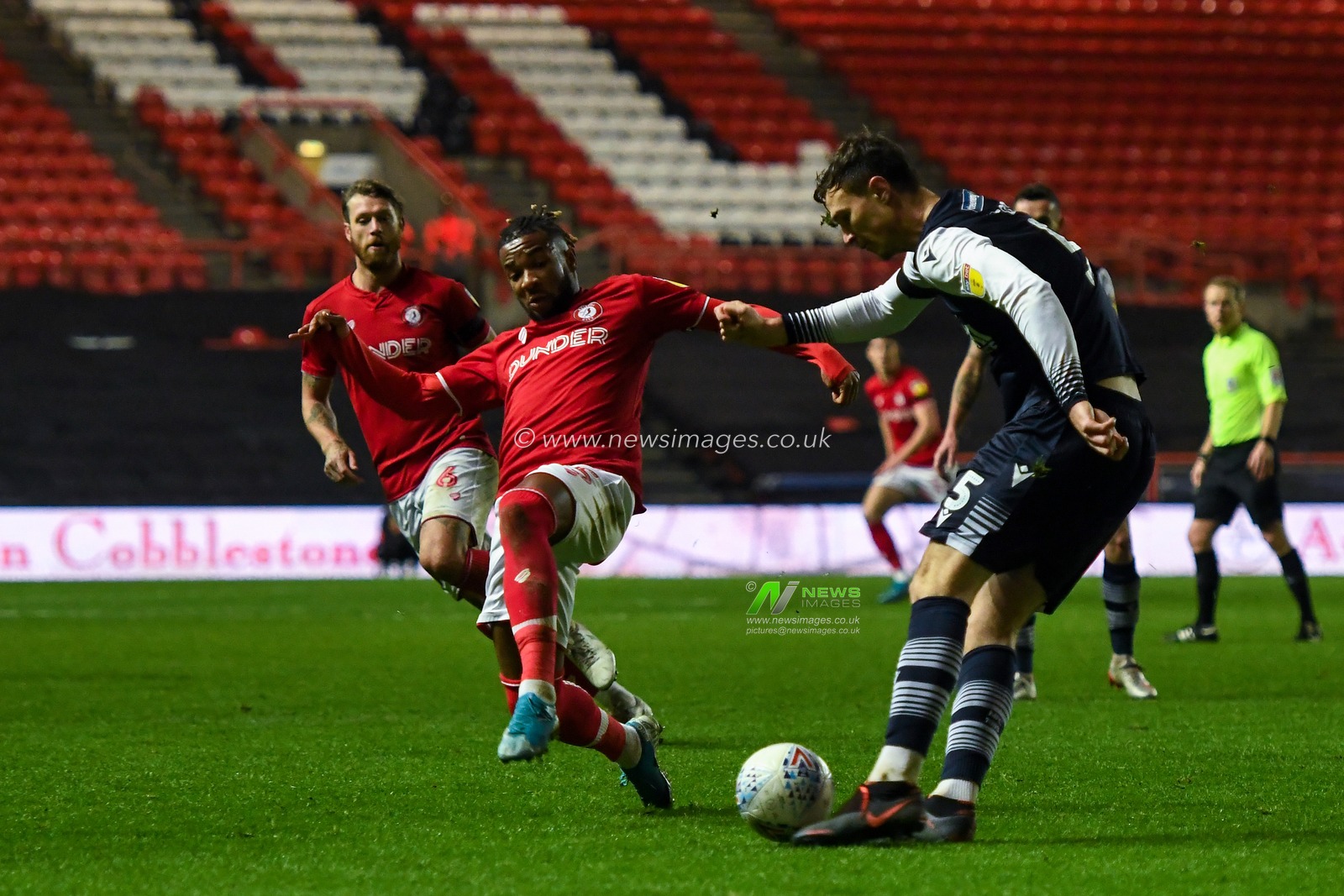 10th December 2019, Ashton Gate, Bristol, England; Sky Bet Championship, Bristol City v Millwall : Kasey Palmer (45) of Bristol City applies pressure to Jake Cooper (05) of Millwall 

Credit: Gareth Dalley/News Images