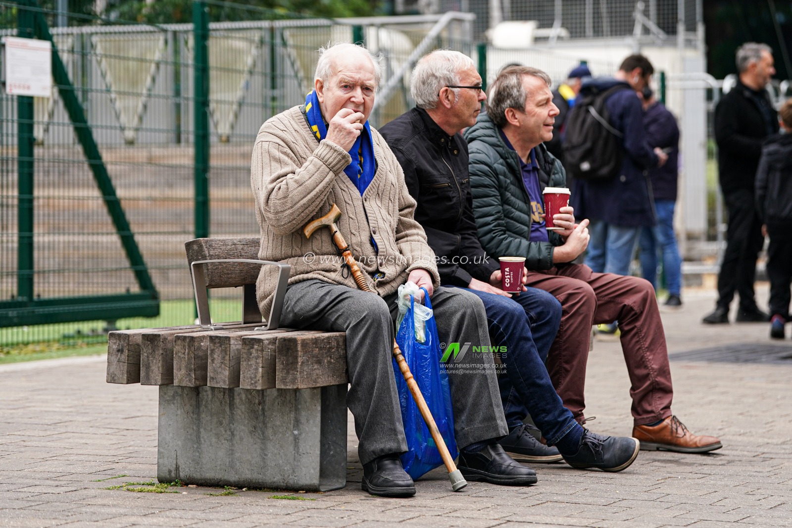 Wimbledon fan eating on bench outside Wembley stadium ahead of the Sky Bet League 2 Playoff Final match AFC Wimbledon vs Walsall at Wembley Stadium, London, United Kingdom, 26th May 2025

(Photo by Harvey Murphy/News Images)
