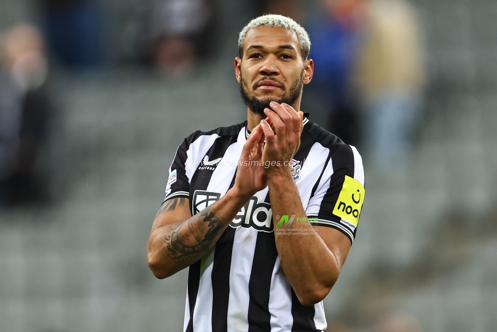 Joelinton #7 of Newcastle United applauds the fans after Newcastle lose 1-2 during the UEFA Champions League match Newcastle United vs AC Milan at St. James's Park, Newcastle, United Kingdom, 13th December 2023

(Photo by Mark Cosgrove/News Images)