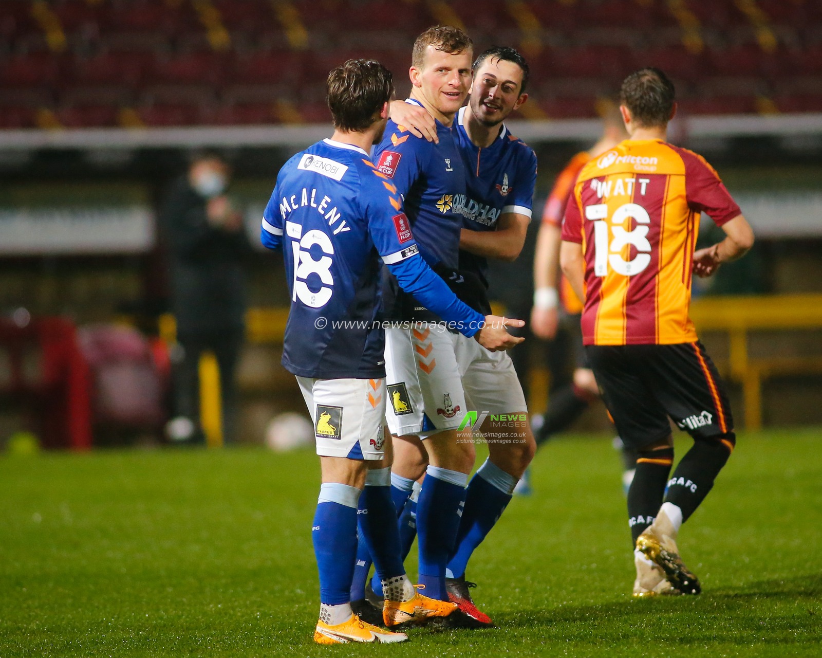Celebration Danny Rowe #9 (C) of Oldham Athletic celebrates scoring the goal alongside his team mates to make the score 1-2