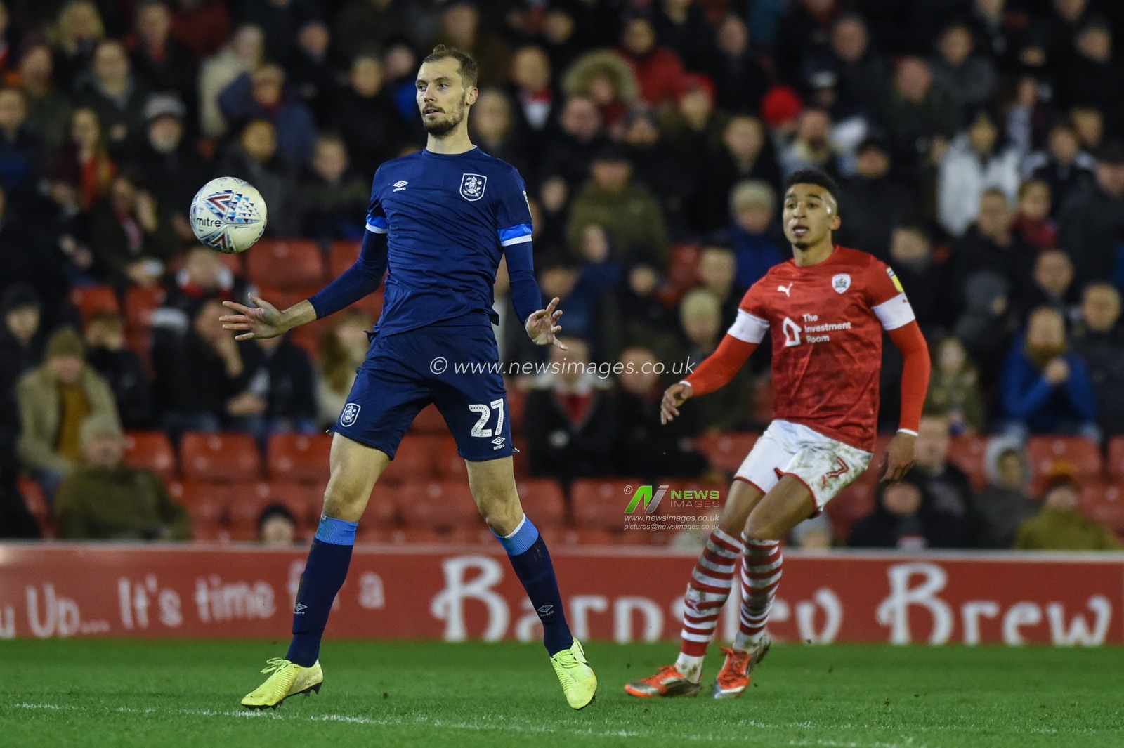 11th January 2020, Oakwell, Barnsley, England; Sky Bet Championship, Barnsley v Huddersfield Town : Jon Gorenc Stankovic (27) of Huddersfield Town controls a high ball.

Credit: Dean Williams/News Images
