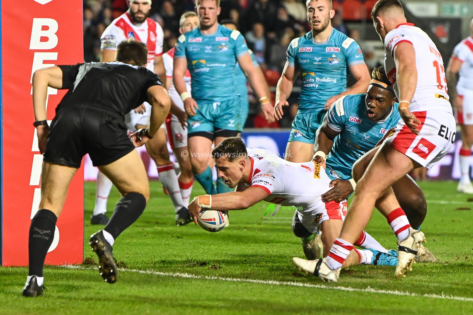 Lewis Dodd #7 of St. Helens goes over for a try during the Betfred Super League Round 3 match St Helens vs Leeds Rhinos at Totally Wicked Stadium, St Helens, United Kingdom, 3rd March 2023

(Photo by Craig Thomas/News Images)