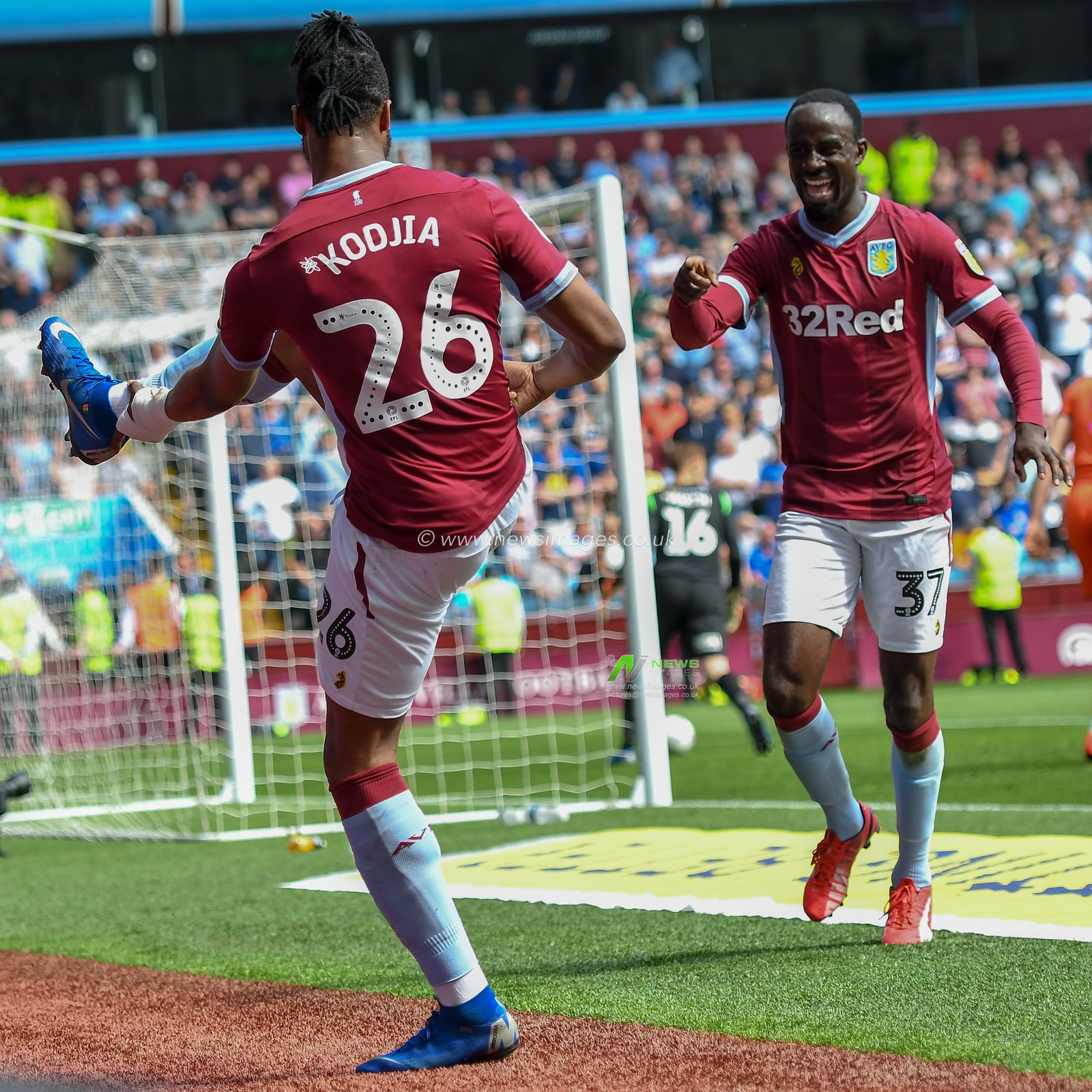 22nd April 2019 , Villa Park, Birmingham, England ; Sky Bet Championship, Aston Villa vs Millwall : Jonathan Kodjia (26) of Aston Villa and Albert Adomah (37) of Aston Villa celebrate Aston Villas opening goal

Credit: Gareth Dalley/News Images

English Football League images are subject to DataCo Licence