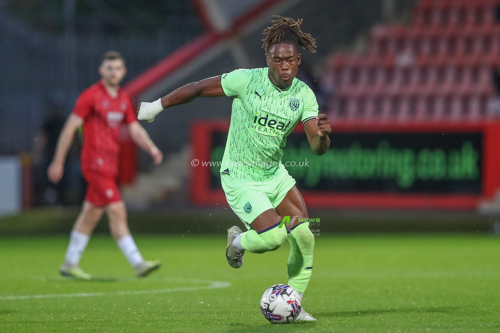 Brandon Thomas-Asante #21 of West Bromwich Albion breaks with the ball during the Pre-season friendly match Cheltenham Town vs West Bromwich Albion at The Completely-Suzuki Stadium, Cheltenham, United Kingdom, 18th July 2023

(Photo by Gareth Evans/News Images)