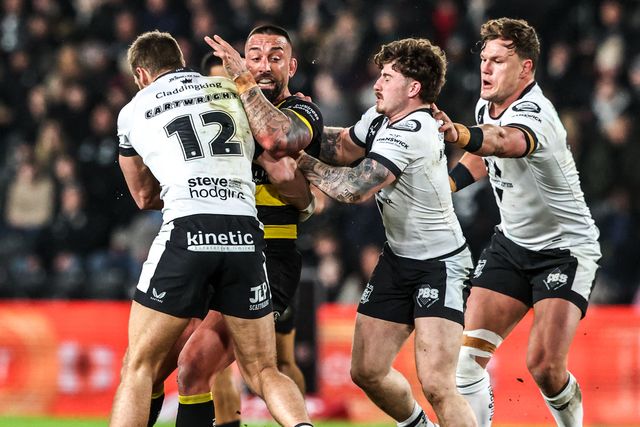 Paul Vaughan of York Knights is tackled by Amir Bourouh of Hull FC and Jed Cartwright of Hull FC during the Betfred Super League match Hull FC vs York Knights at MKM Stadium, Hull, United Kingdom on 27 February 2026

(Photo by Alfie Cosgrove/News Images)