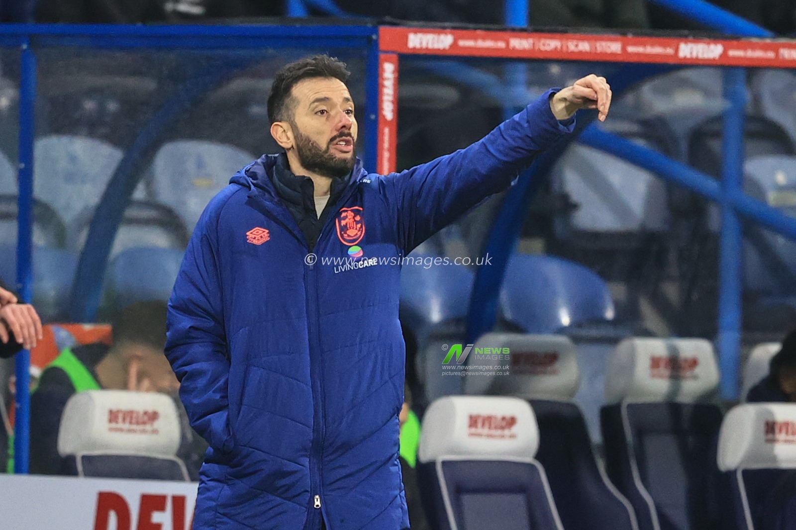 Carlos CorberÃ¡n manager of Huddersfield Town gives his team instructions