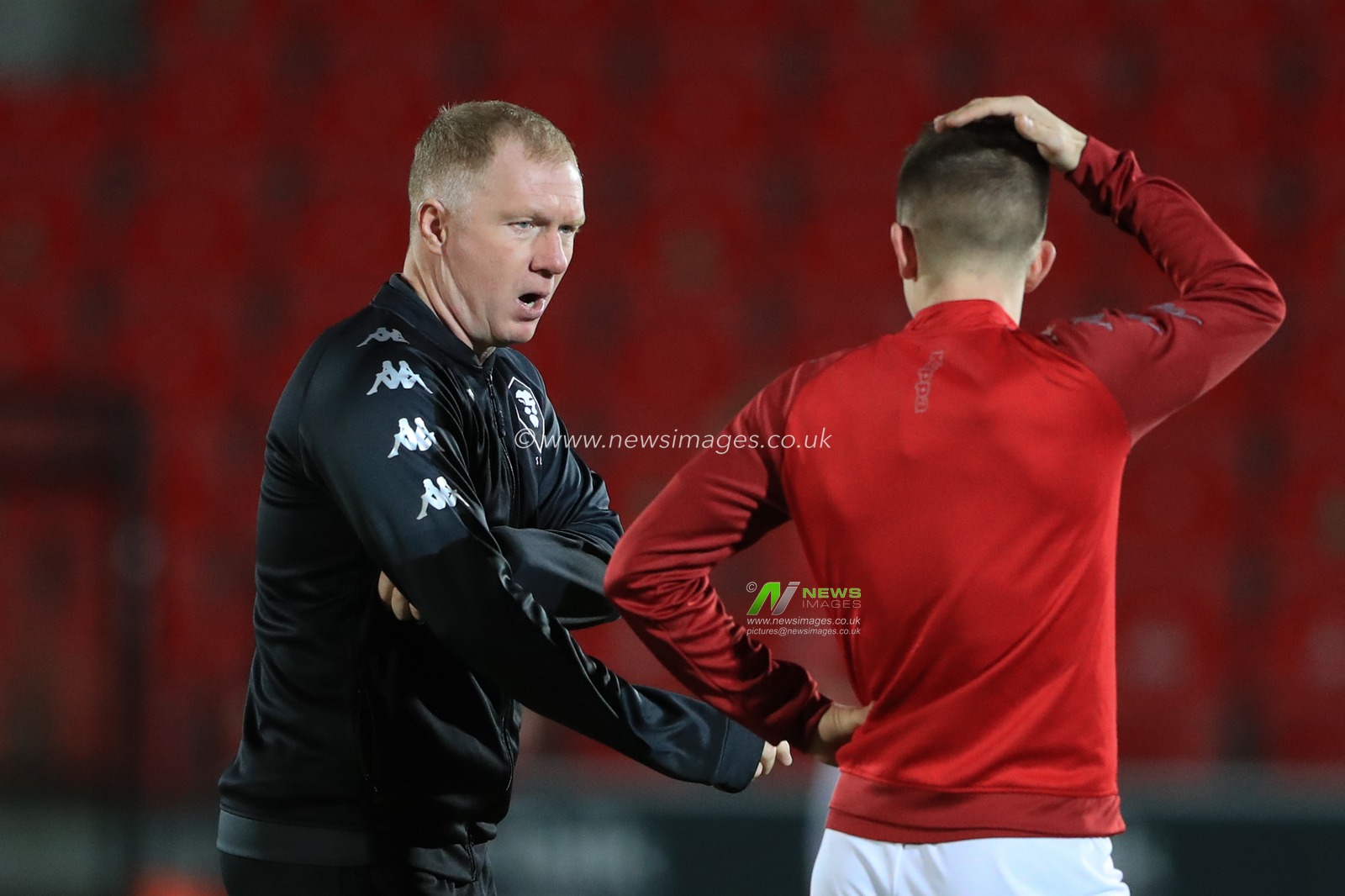 Paul Scholes manager of Salford City gives instructions during pre game warmup