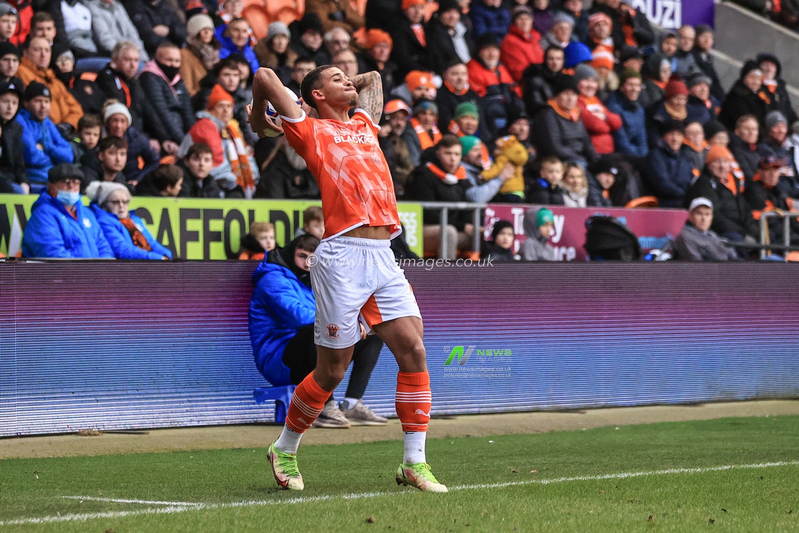 Jordan Lawrence-Gabriel #4 of Blackpool takes a throw-in