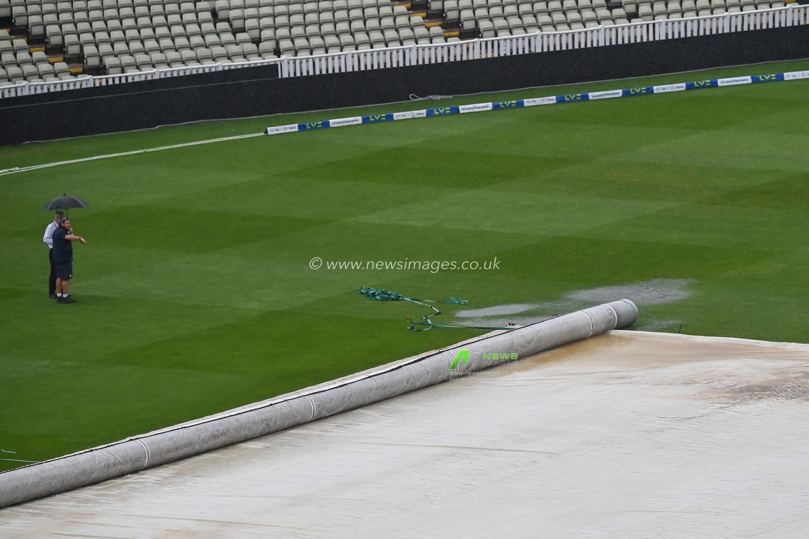 A general view of Edgbaston as heavy rain falls and pools of water on the edge of the covers ahead of the LV= Insurance Ashes First Test Series Day 5 England v Australia at Edgbaston, Birmingham, United Kingdom, 20th June 2023

(Photo by Craig Thomas/News Images)