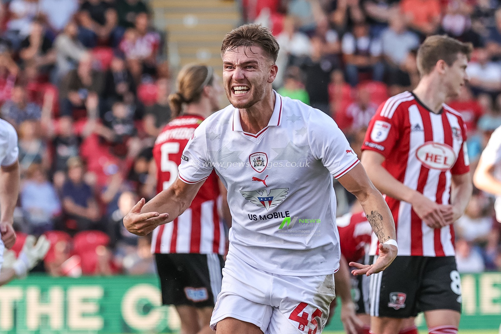 John Mcatee #45 of Barnsley celebrates his goal to make it 0-1 during the Sky Bet League 1 match Exeter City vs Barnsley at St James' Park, Exeter, United Kingdom, 7th October 2023

(Photo by Mark Cosgrove/News Images)