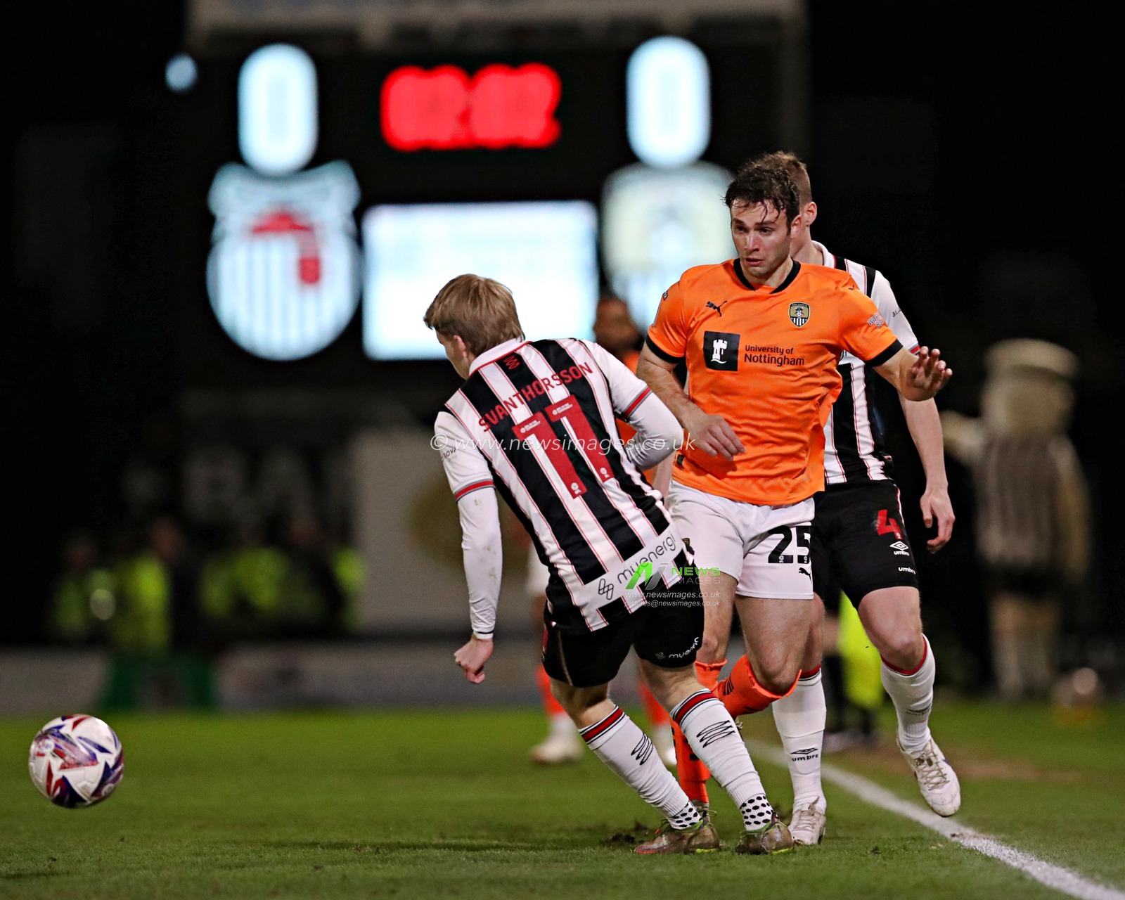 Nicholas Tsaroulla of Notts County is pressured by Jason DaÃ°i SvanÃ¾Ã³rsson of Grimsby Town during the Sky Bet League 2 match Grimsby Town vs Notts County at Blundell Park, Cleethorpes, United Kingdom, 11th March 2025

(Photo by Sam Eaden/News Images)