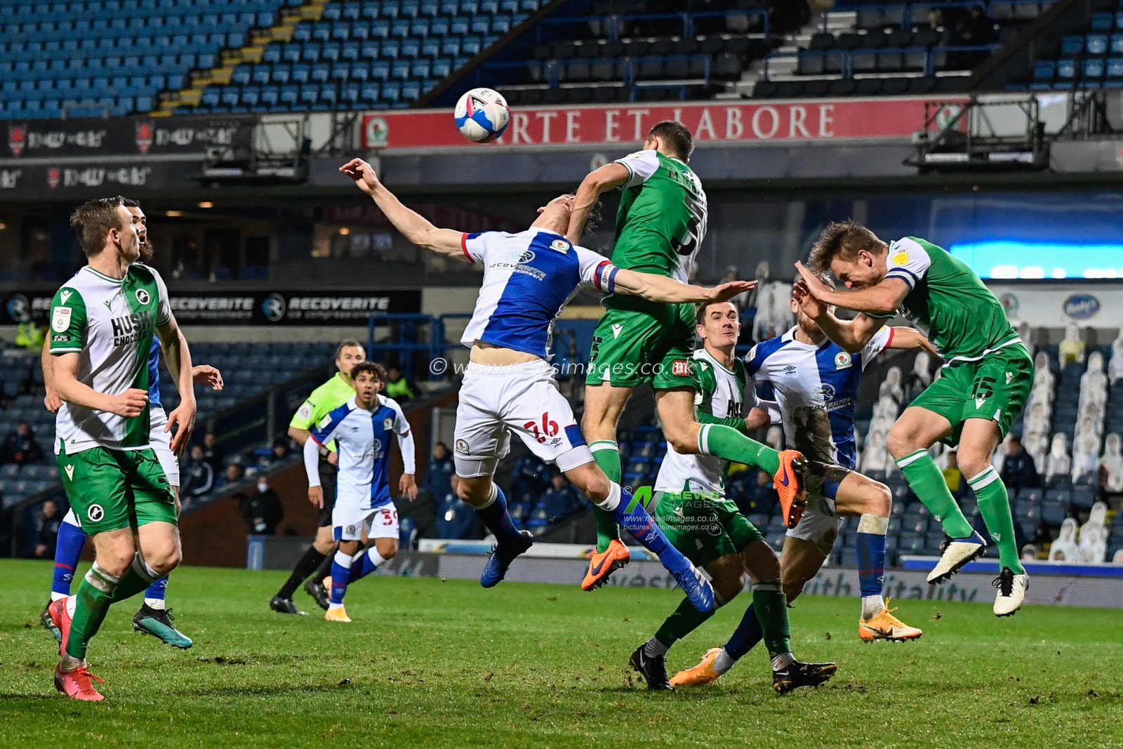 Murray Wallace #3 of Millwall challenges Darragh Lenihan #26 of Blackburn Rovers for the ball in the air