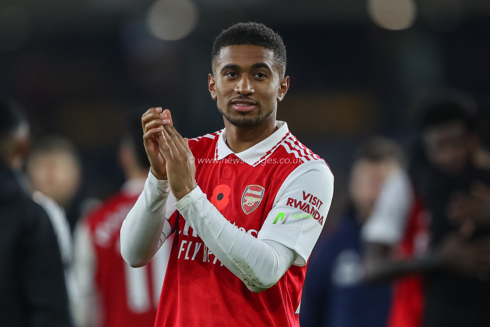 Reiss Nelson #24 of Arsenal applauds the travelling fans after the Premier League match Wolverhampton Wanderers vs Arsenal at Molineux, Wolverhampton, United Kingdom, 12th November 2022

(Photo by Gareth Evans/News Images)