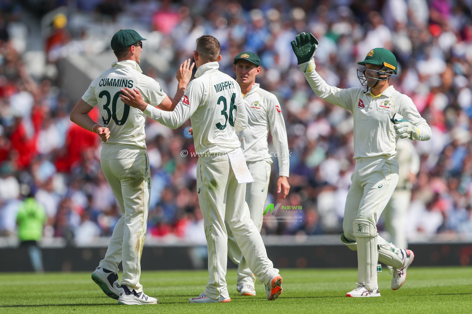 Pat Cummings of Australia and Todd Murphy of Australia celebrate the dismissal of Ben Stokes of England during the LV= Insurance Ashes Fifth Test Series Day Three match England vs Australia at The Kia Oval, London, United Kingdom, 29th July 2023

(Photo by Gareth Evans/News Images)