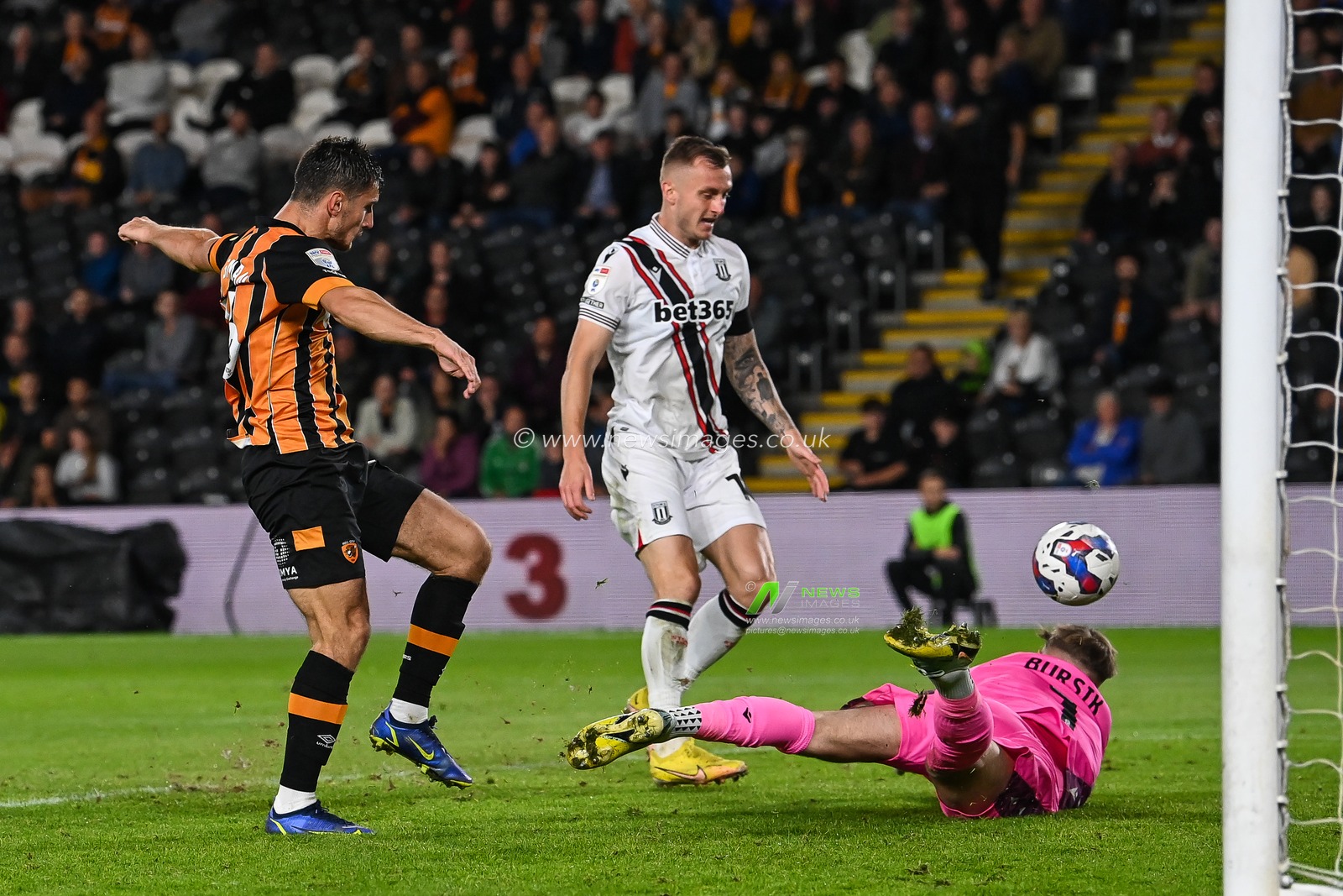 Ryan Longman #16 of Hull City shoots at goal but its saved by Josef Bursik #1 of Stoke City during the Sky Bet Championship match Hull City vs Stoke City at MKM Stadium, Hull, United Kingdom, 13th September 2022

(Photo by Craig Thomas/News Images)