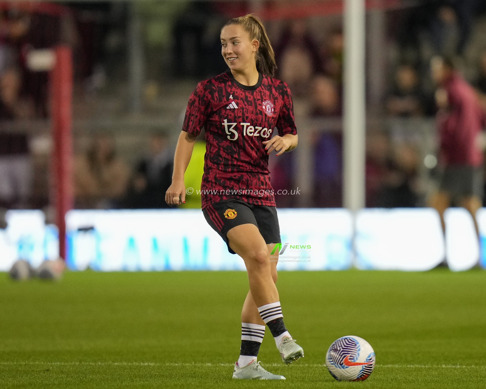 Maya Le Tissier #4 of Manchester United warms up before the The FA Women's Super League match Manchester United Women vs Arsenal Women at Leigh Sports Village, Leigh, United Kingdom, 6th October 2023

(Photo by Steve Flynn/News Images)