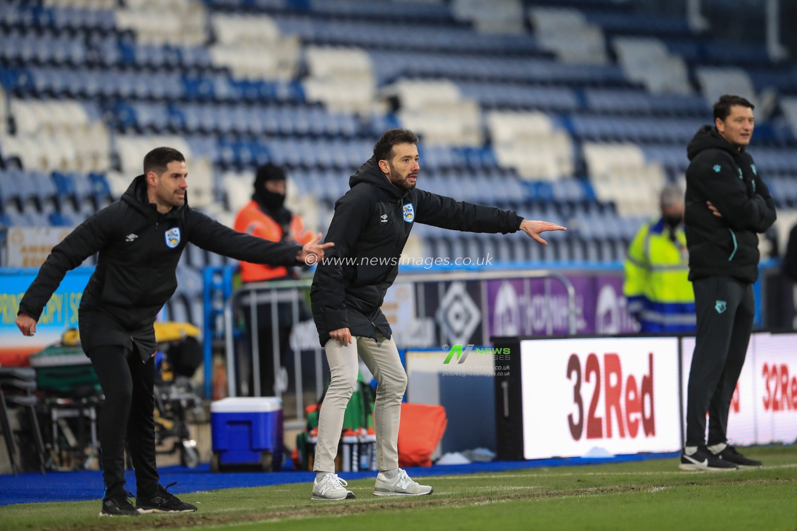 Carlos CorberÃ¡n manager of Huddersfield Town gives his team instructions